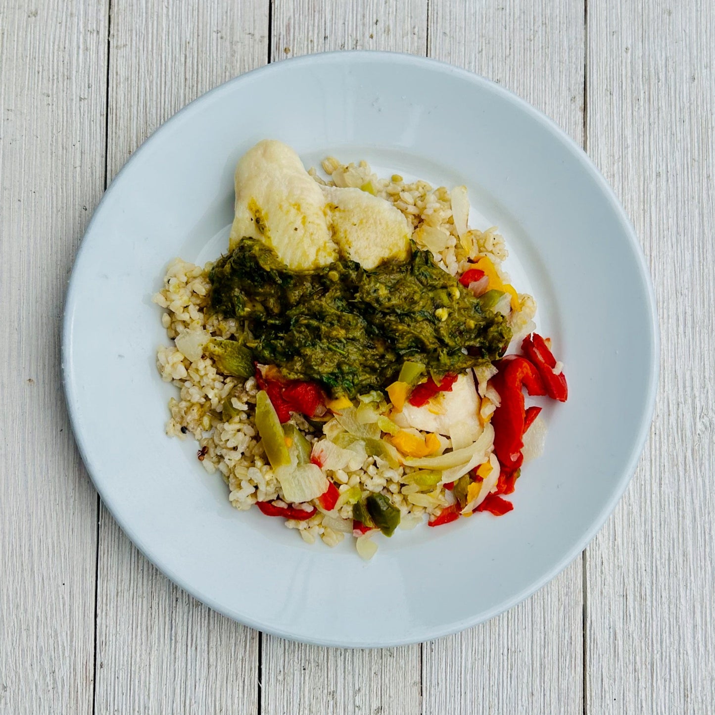 Green Chile White Fish over Brown Rice with Roasted Peppers & Onions (GF)